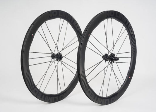 Pair of black bicycle wheels on a white background