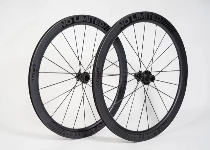 Two black bicycle wheels with 'NO LIMITED' branding on a white background