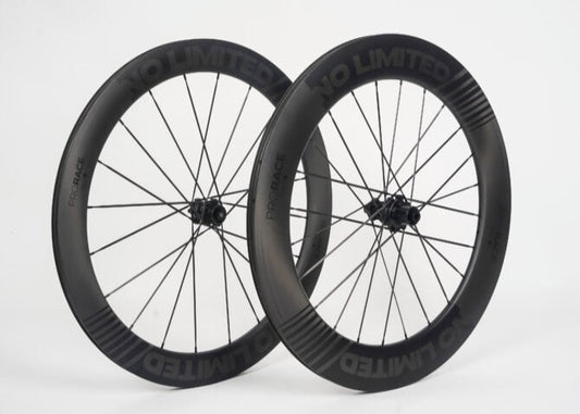 Two bicycle wheels with 'No Limited' branding on a white background