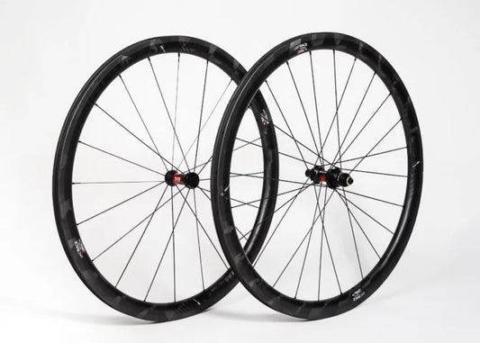 Pair of black bicycle wheels on a white background