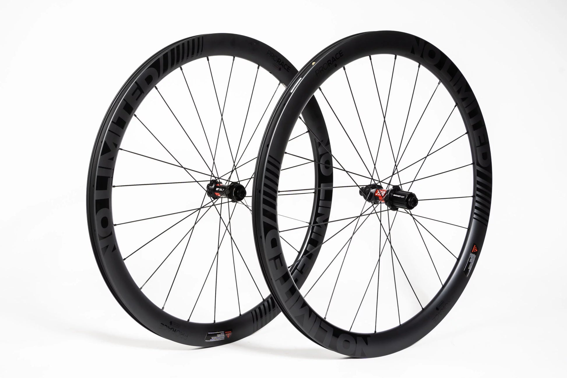 Pair of black bicycle wheels on a white background