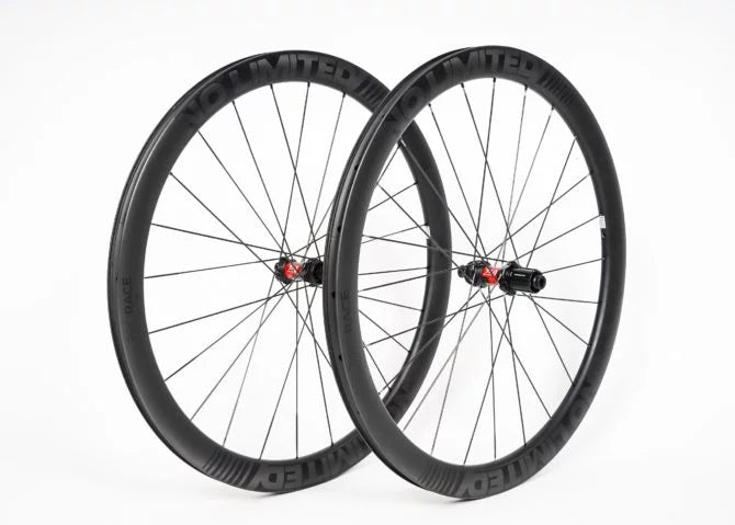 Pair of black bicycle wheels on a white background