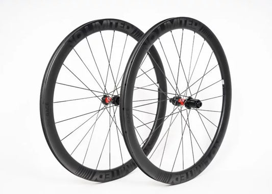 Pair of black bicycle wheels on a white background