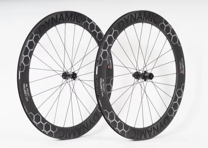 Two bicycle wheels with 'Dynamic' branding on a white background